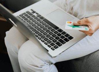 person reading on laptop